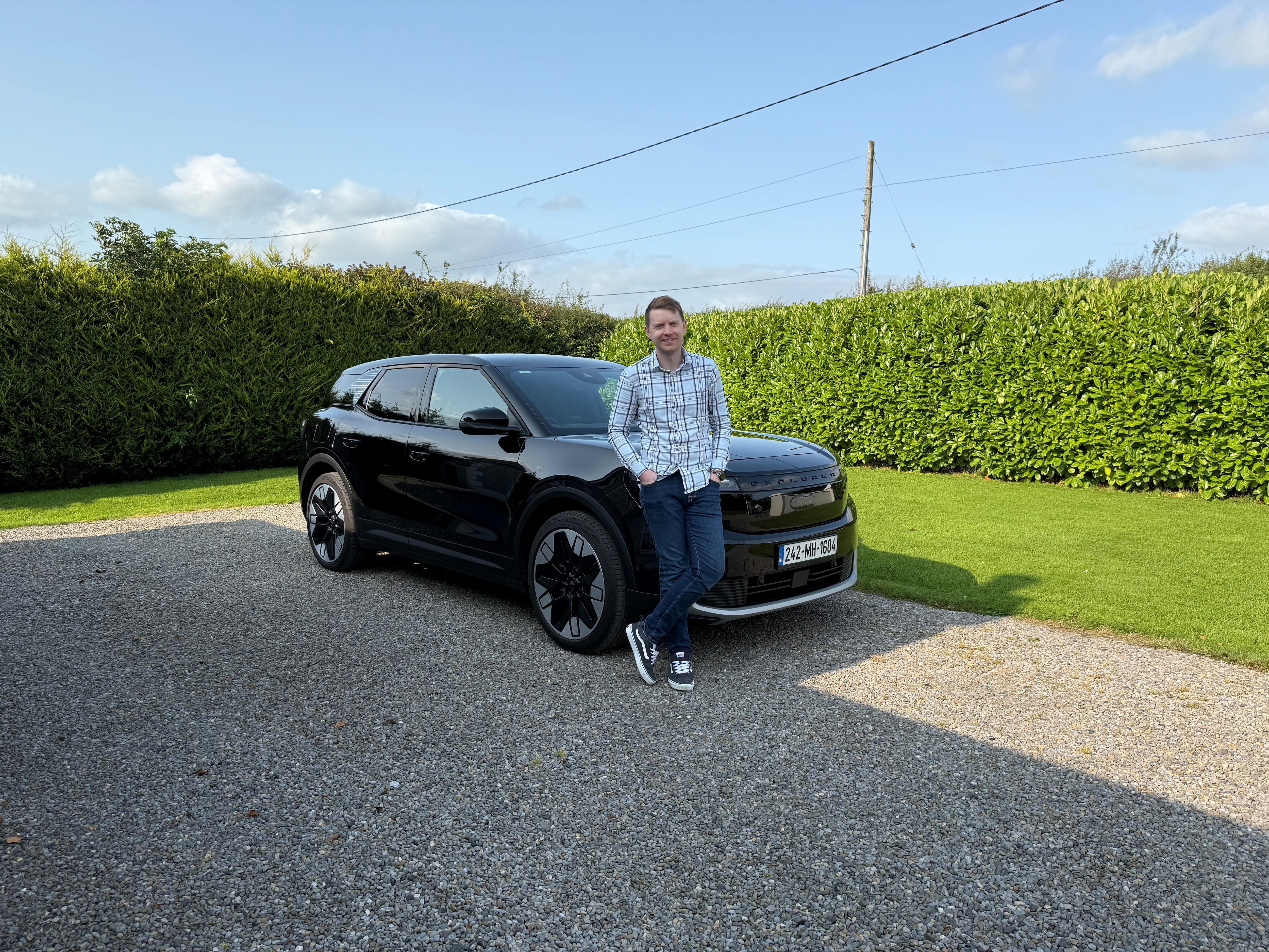 Nick in front of his road-tripping Ford Explorer